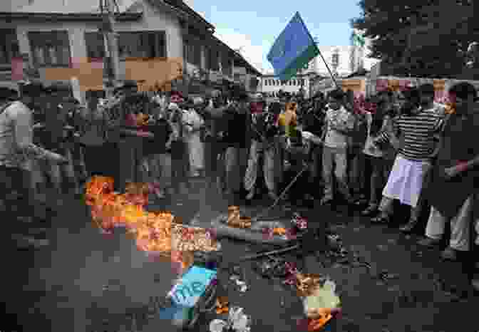 A Group Of Protesters Demand Justice For The Victims Of The Kashmir Conflict. The Human Toll Of The Kashmir Conflict: Grief And Courage In A South Asian BFree Downloadland