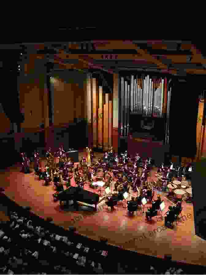 A Panoramic View Of An Orchestra Performing On Stage Maestros And Their Music: The Art And Alchemy Of Conducting