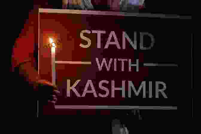 A Young Girl Holds A Candle During A Vigil For The Victims Of The Kashmir Conflict. The Human Toll Of The Kashmir Conflict: Grief And Courage In A South Asian BFree Downloadland