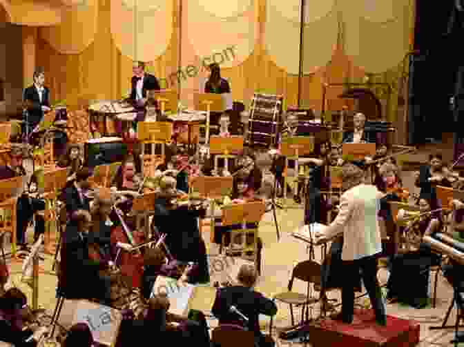 An Orchestra Rehearsing In A Concert Hall, The Conductor Leading Them With Their Baton Maestros And Their Music: The Art And Alchemy Of Conducting